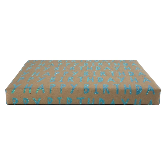 Happy Birthday Wrapping Paper. The paper bag background compliments the blue glitter text. Match this wrapping paper with a birthday card and gift ribbons. 27.5″ x 57″ continuous roll.