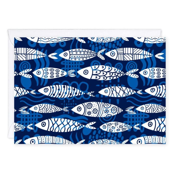 Keep On Swimming Greeting Cards show a school of beautifully decorated white fish swimming on a vibrant blue background.