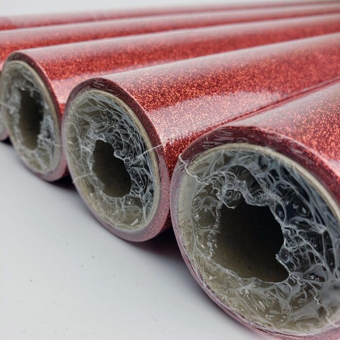 Red Glitter Wrapping Paper. Celebrate with this wrapping paper covered in ultra-shiny red glitter. For those who love to sparkle, these papers are brilliant. 27.5″ x 59" continuous roll.