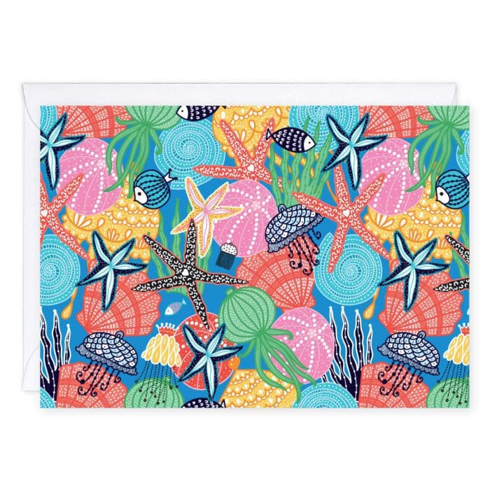 A brightly colored illustration of starfish, jellyfish, and different sea creatures together on a blue background, this cheerful card shows them swimming around together.