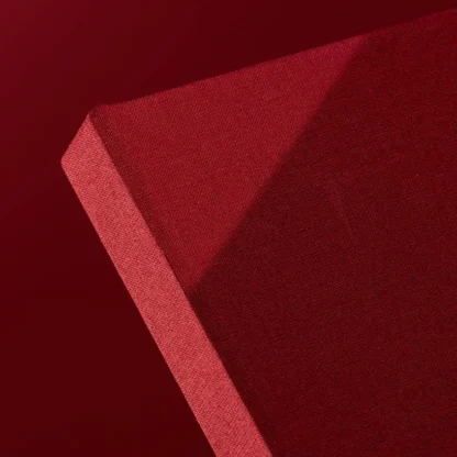 Wine Red Hardcover Notebook. Cloth. Side shot of the cloth wine red notebook.